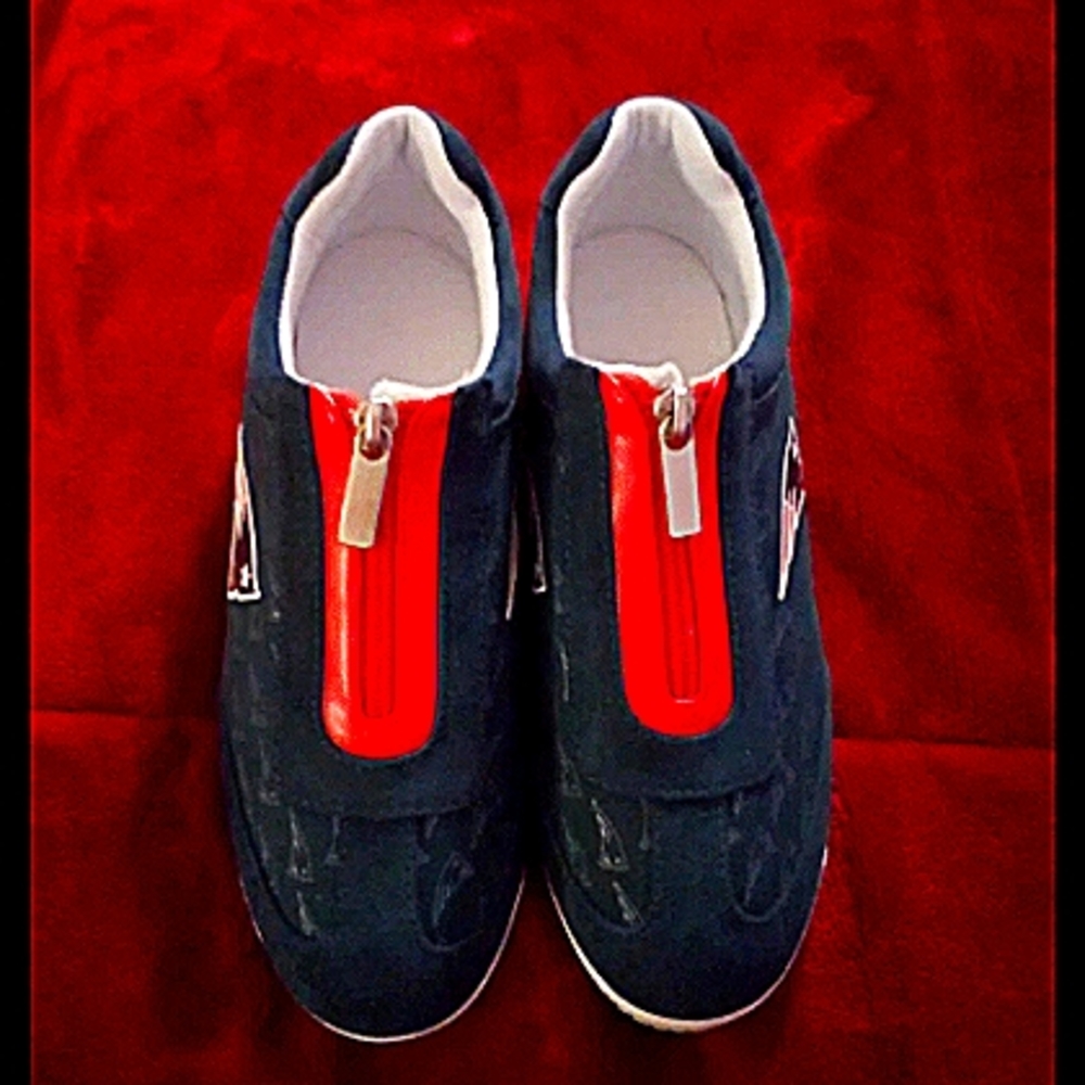 NFL-licensed zippered sneakers with team logo on a tonal logo pattern size 7